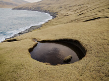 Water Hole Along Cliffside In The Faroe Islands