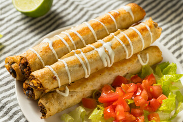 Wall Mural - Homemade Mexican Chicken Flautas with Crema