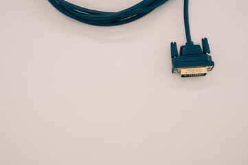 Canvas Print - High angle closeup shot of a cable on a beige surface