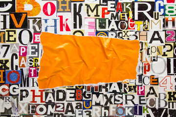 Wall Mural - Torn and crumpled piece of orange paper on collage from clippings with newspaper magazine letters and numbers. Creased orange paper on alphabet letters cutting from magazine. Copy space for text.