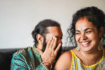 Poster - Cheerful indian wife and husband having fun together at home - Focus on woman face