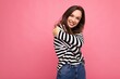© Ivan Traimak - Portrait of positive cheerful fashionable woman in casual clothes isolated on pink background with copy space