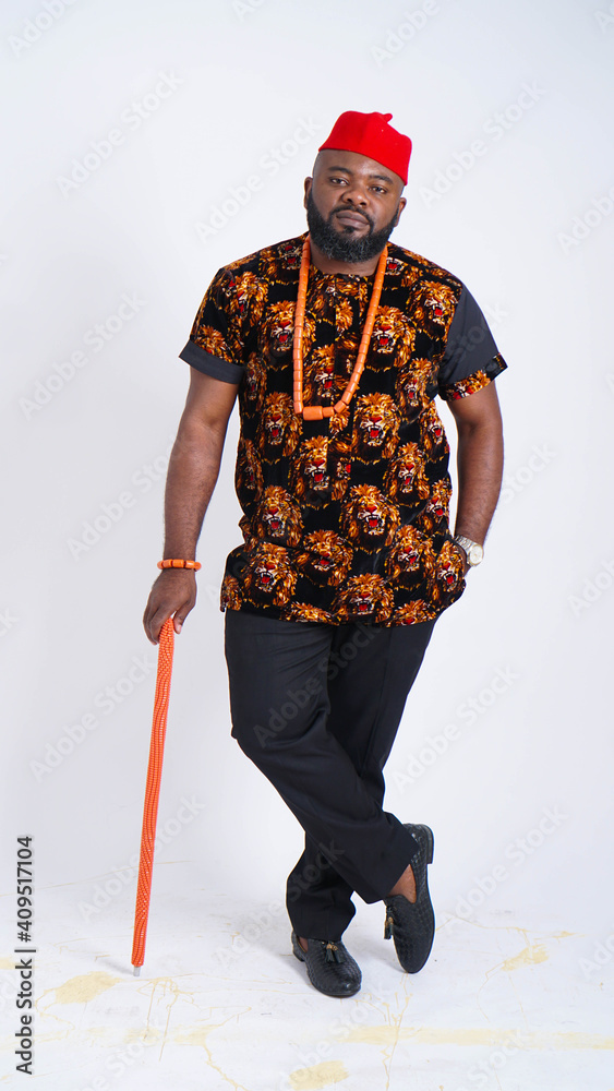 Portrait of happy Nigerian man dressed in Igbo traditional attire Stock Photo Adobe Stock