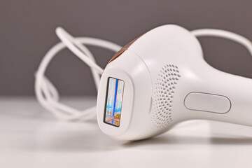 Small IPL 'Intense Pulsed Light' laser hair removal device for usage at home