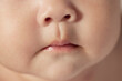 © eastfenceimage - Close-up of nose and mouth of baby