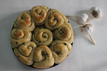 Wall Mural - Rolled garlic bread baked at home