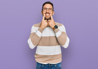 Poster - Handsome man with beard wearing casual clothes and glasses smiling with open mouth, fingers pointing and forcing cheerful smile