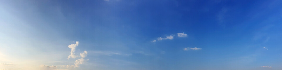 Panorama sky with beautiful cloud on a sunny day. Panoramic high resolution image.