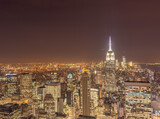 Fototapeta Nowy Jork - Night view of New York Manhattan during sunset