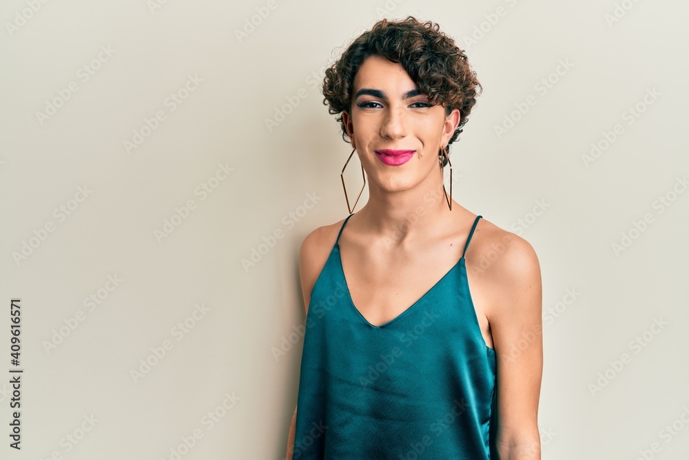 Young transgender man wearing make up and woman clothes, looking fashion and glamorous - obrazy, fototapety, plakaty 