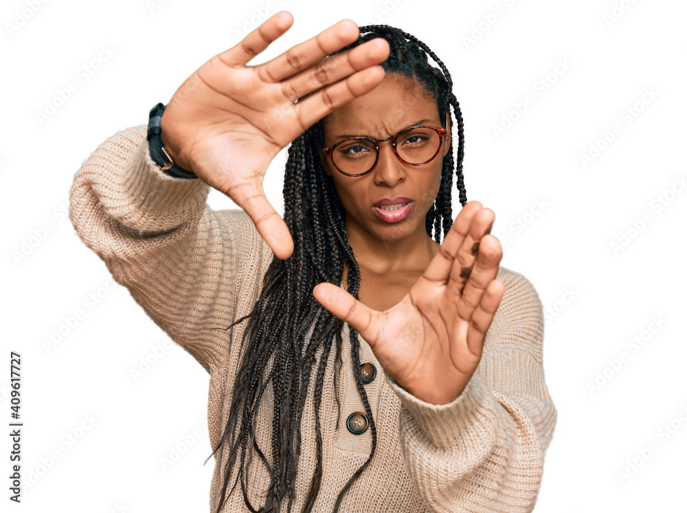 African american woman wearing casual clothes doing frame using hands palms and fingers, camera perspective
