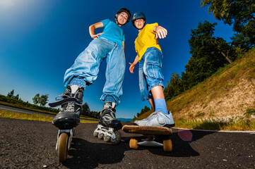 Wall Mural - Happy young people rollerblading, skateboarding