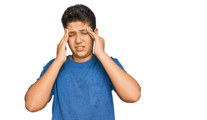 Wall Mural - Teenager hispanic boy wearing casual clothes with hand on head for pain in head because stress. suffering migraine.