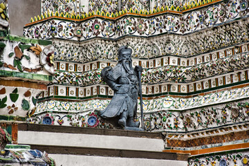 Wall Mural - Temple of Dawn, Wat Arun is a buddhist temple and derives its name from the Hindu god Aruna often personified as the radiations of the rising sun