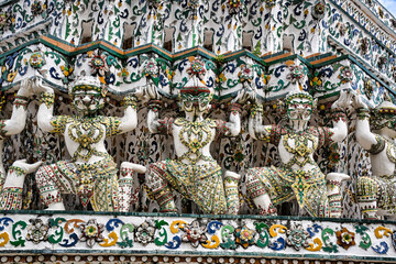 Wall Mural - Temple of Dawn, Wat Arun is a buddhist temple and derives its name from the Hindu god Aruna often personified as the radiations of the rising sun