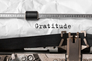 Wall Mural - Text Gratitude typed on retro typewriter