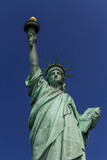 Fototapeta Miasta - An image of the front side of the Statue of Liberty taken from below