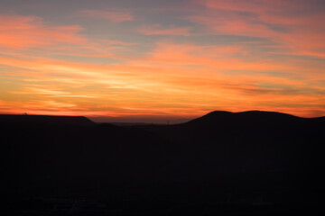 Wall Mural - Colorful sunset over the mountain hills. Beautiful landscape in Azerbaijan nature.