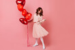 © Look! - Full length shot of gorgeous curly girl with party balloons. Romantic young woman posing in valentine's day.