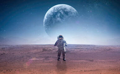 Poster - Spaceman on surface of red planet. Astronaut at space. Planet on background. Landscape of other world. Elements of this image furnished by NASA.