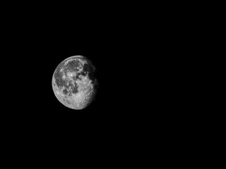 Wall Mural - close up of eighty seven percent of waning gibbous moon / the waning gibbous is an intermediary moon