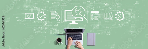 Obraz Dibond Document management system concept with person working with a laptop