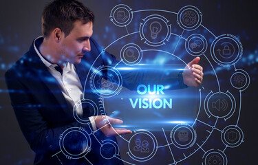 Business, Technology, Internet and network concept. Young businessman working on a virtual screen of the future and sees the inscription: Our vision