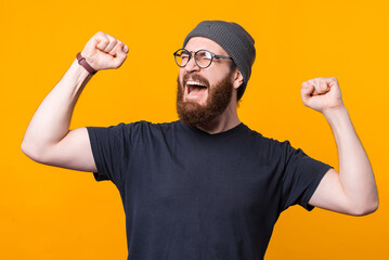 Wall Mural - A portrait of a young man screaming of excitement .