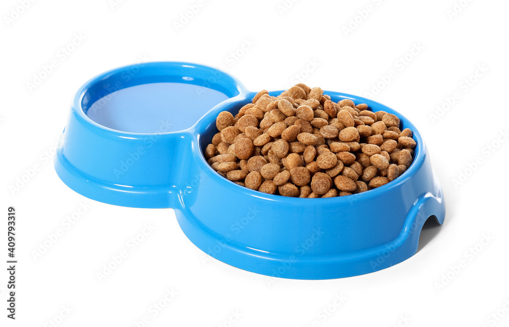 Pet food and water in bowl on white background