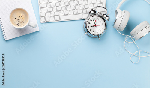 Obraz Dibond Office desk with supplies, alarm clock and coffee