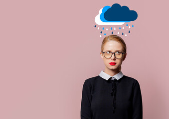 Wall Mural - Blonde woman black dress and glasses with headache and drawn rain on pink background