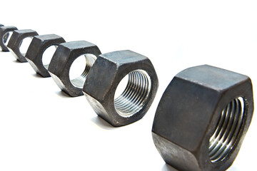 Poster - Row metal nuts on isolated white