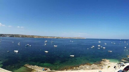 Wall Mural - A timelapse of Mellieha Bay in Malta