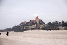 Landscape On A Winter Day On The Beach In Łeba In Poland With A Historic Hotel