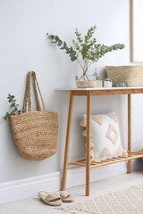 Poster - Vase with fresh eucalyptus branches on table in room. Interior design