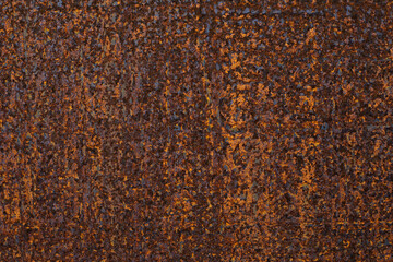 Old rusty metal sheet with traces of corrosion and rust, texture