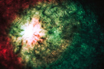 Aufkleber - Beautiful abstract texture circle in green, red light. Background pattern for design. Macro photography view.