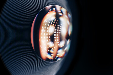 Poster - Beautiful abstract camera lens background multi colored glass reflection.