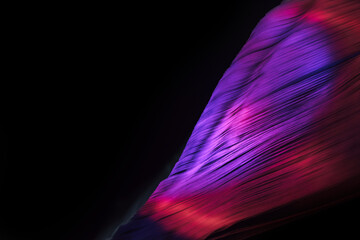 Fototapete - Close up Beautiful book pages in the multi color light on a night. Background pattern for design. Macro photography view.