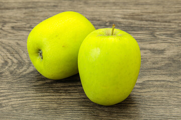 Two ripe green sweet apples