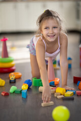 Wall Mural - Girl six years old playing