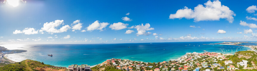 Wall Mural - Wide Panorama view of the Caribbean island of St.maarten.  Wide angle view of the Caribbean sea. 