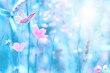 Beautiful wildflowers, butterfly in the dreamy meadow. Delicate pink and blue colors pastel toned. Shallow depth macro background. Nature floral springtime