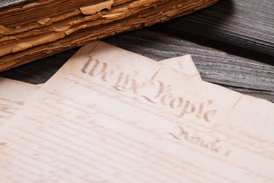 Close-up old ancient book and papers. Retro handwriting concept.