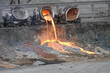 Pouring out the remains of blast furnace slag from the slag truck. Blast furnace production.
