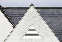 A Triangular Slotted Vent In The  Gable End Of A Building In Gwynedd, Wales, UK.
