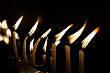  burning candle making light in view as a background