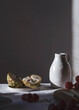 © Bego Simon/ADDICTIVE STOCK - Ceramic jug placed on table with sweet fruits and delectable cheese in bright room lit by sunlight