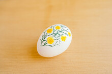 Top View Of Chicken Egg Painted With Aquarelle Placed On Table For Easter