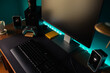 © Jesus Diaz/ADDICTIVE STOCK - Modern stylish black gaming computer with keyboard and speakers placed on table near joystick lamp and stationery